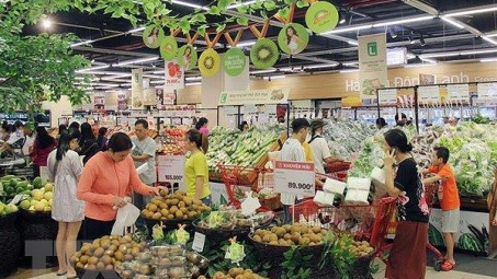 Ngày mùng 2 Tết, thị trường đã sôi động hơn