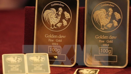 Giá vàng ở châu Á đi xuống trong phiên mở cửa sáng 1/4