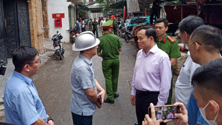 Phó Thủ tướng Trần Lưu Quang chỉ đạo khắc phục hậu quả vụ cháy chung cư tại Khương Hạ (Hà Nội)