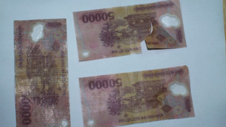 Từ ngày 20/01/2014, đổi tiền rách, hỏng không mất phí