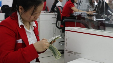 Ngân hàng Nhà nước khẳng định sẽ không điều chỉnh tỷ giá ngoại tệ