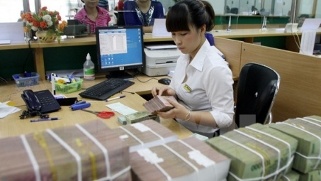 Phấn đấu đến cuối năm 2015 đưa tỷ lệ nợ xấu dưới 3%