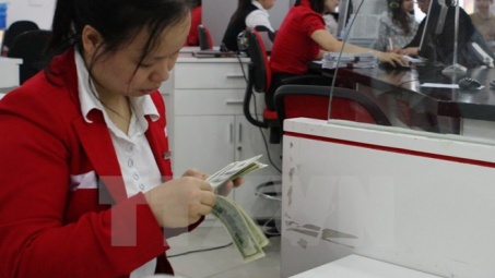 Ngân hàng Nhà nước quyết định tiếp tục nâng giá đồng USD
