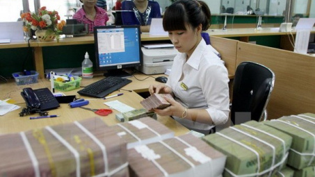 Thành phố Hồ Chí Minh phấn đấu đưa tỉ lệ nợ xấu xuống dưới 3%