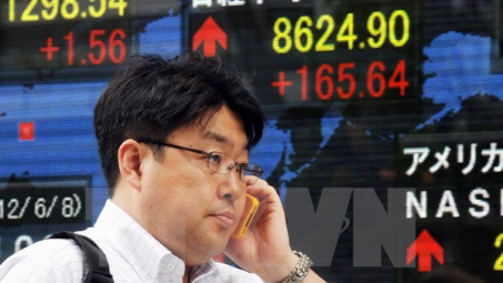 Chứng khoán châu Á ngược dòng đi lên vào cuối phiên ngày 28/1/2015