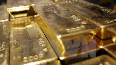 Đồng USD yếu đi hỗ trợ giá vàng tại thị trường châu Á tăng nhẹ