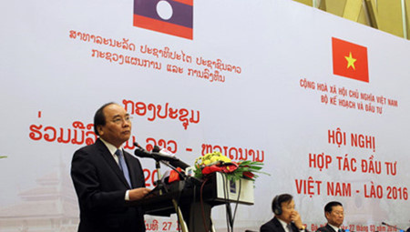 Vietnam, Laos step up investment ties