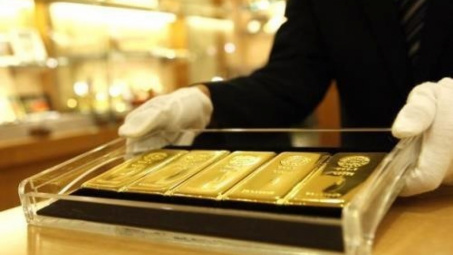 Giá vàng có thể rơi xuống 1.209 USD/ounce