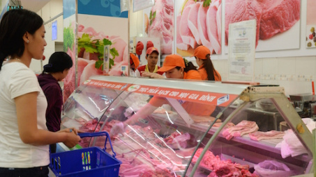 Firms promote pork demand, farmers struggle 