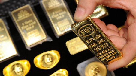 Giá vàng châu Á đi xuống sau khi vượt ngưỡng 1.300 USD/ounce