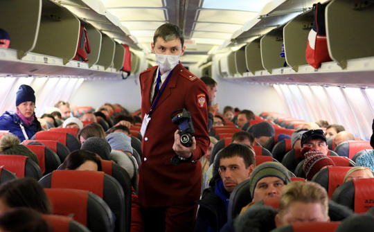 Vị trí ngồi an toàn nhất trên máy bay để giảm nguy cơ nhiễm virus Covid-19