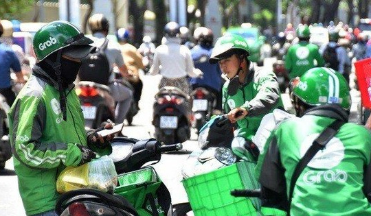 Bộ Công Thương yêu cầu Grab thông báo rõ về chính sách phụ phí, giá cước