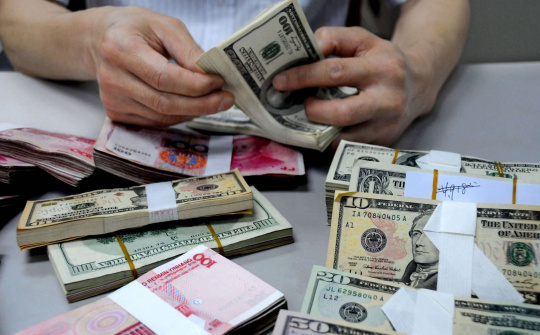 IMF: Vị thế thống trị của đồng USD đang dần suy yếu