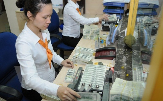 Tăng tỷ giá giữa đồng Việt Nam và USD kể từ ngày 7/1/2015