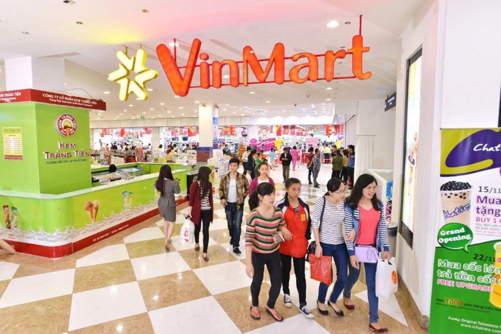 9 siêu thị và cửa hàng tiện ích đầu tiên trong hệ thống chuỗi 100 siêu thị VinMart và 1.000 cửa hàng tiện ích VinMart+ đồng loạt khai trương ngày 20/11/2014 tại Hà Nội. Đây là thương hiệu bán lẻ của Tập đoàn Vingroup. (Ảnh: Vingroup)
