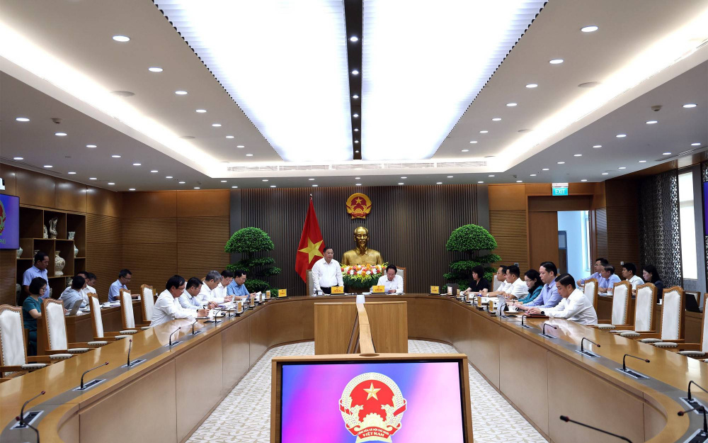Phó Thủ tướng Thường trực Chính phủ Phạm Gia Túc và Phó Thủ tướng Lê Tiến Châu chủ trì cuộc làm việc với Bộ Công Thương cùng một số bộ, ngành - Ảnh: VGP